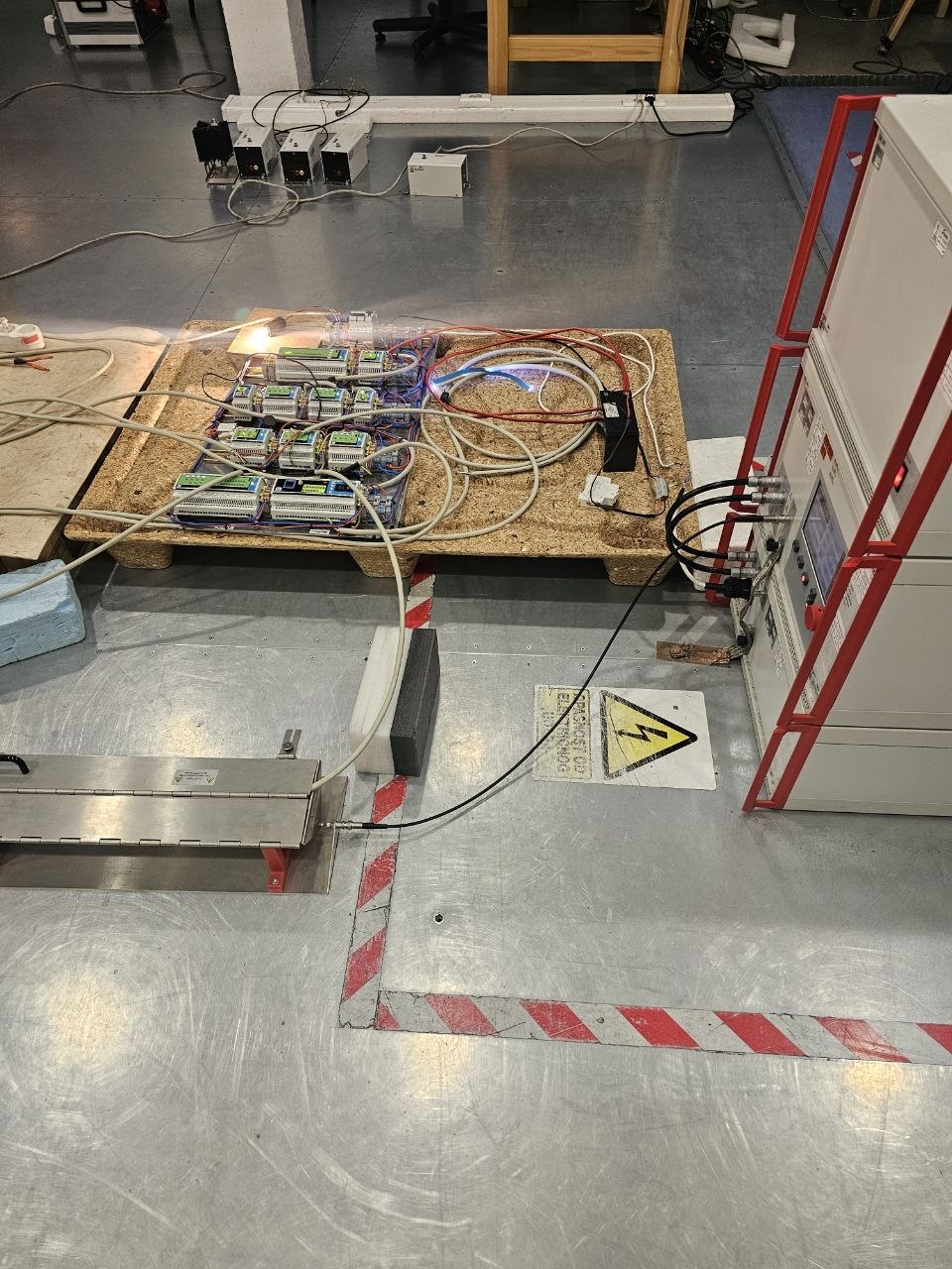 HomeMaster modules on a bench test rig with automated test equipment