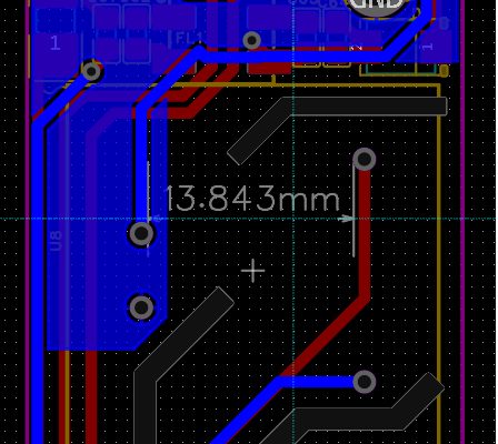 PCB layout with a 13.843 mm clearance dimension between isolated regions