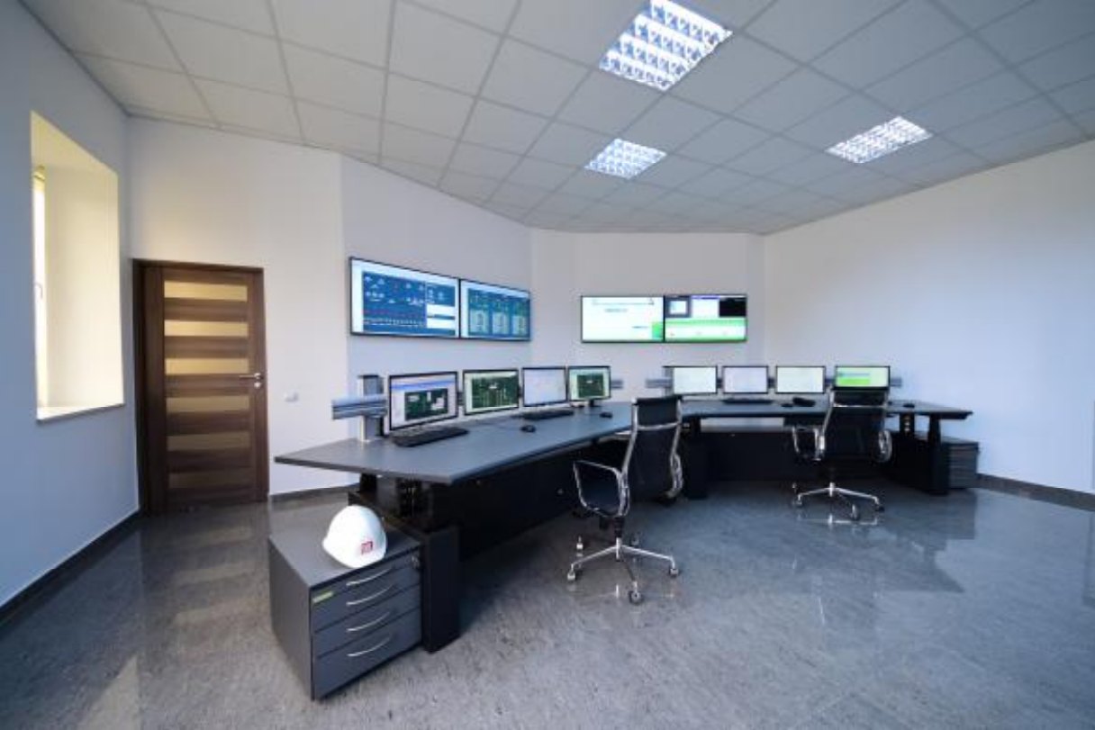 Central control room with operator consoles and overview displays
